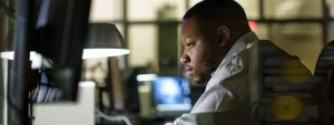a government employee entering data into a computer system for federal processing registry and sam renewal.